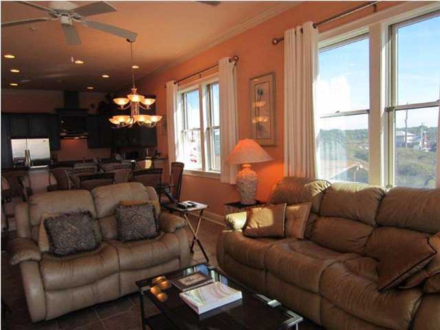 6073 West C30a Santa Rosa Beach, Unit 101 Santa Rosa Beach, FL 32459 - Photo 3 of 15 a living room with furniture and a large window