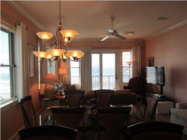 6073 West C30a Santa Rosa Beach, Unit 101 Santa Rosa Beach, FL 32459 - Photo 4 of 15 a view of a dining room with furniture window and outside view