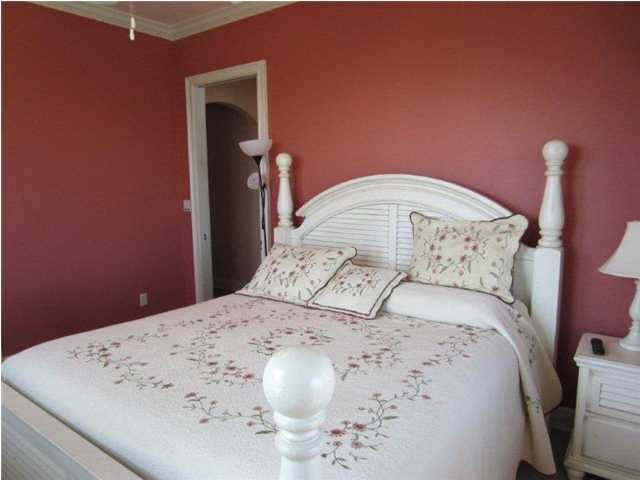 6073 West C30a Santa Rosa Beach, Unit 101 Santa Rosa Beach, FL 32459 - Photo 7 of 15 a bedroom with a bed and a dresser