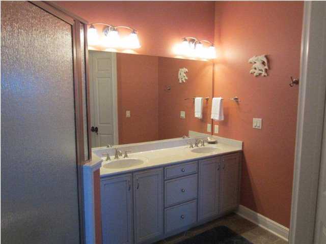 6073 West C30a Santa Rosa Beach, Unit 101 Santa Rosa Beach, FL 32459 - Photo 8 of 15 a bathroom with a double vanity sink and a mirror