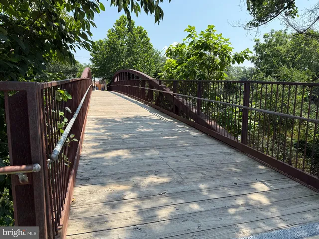 a view of balcony and yard