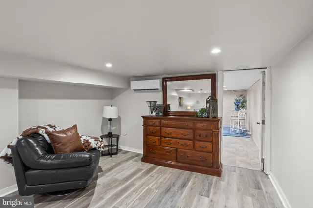 a kitchen with sink refrigerator and microwave