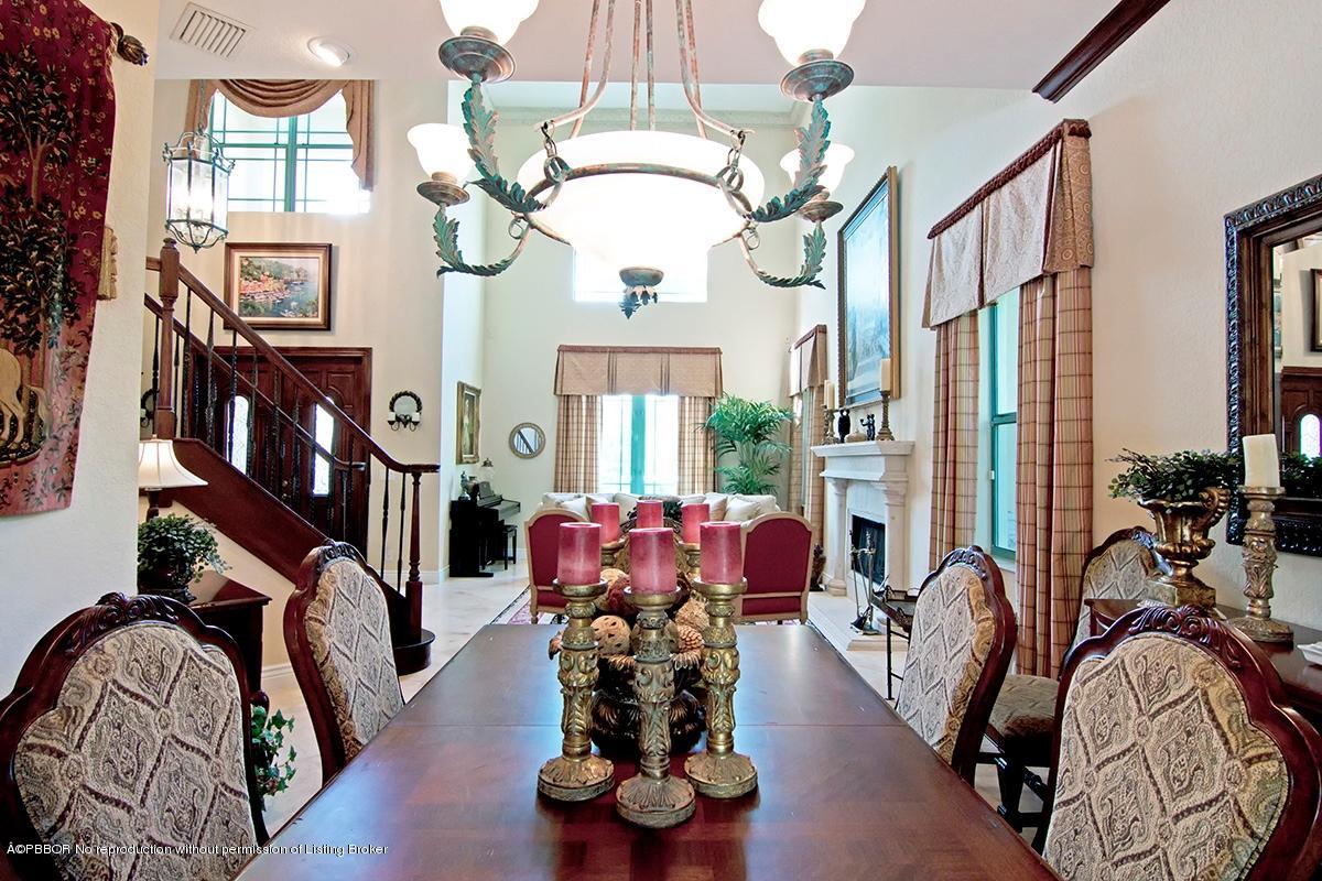 338 Southwest 16th Street Boca Raton, FL 33432 - Photo 2 of 31 a living room with furniture chandelier and a large window