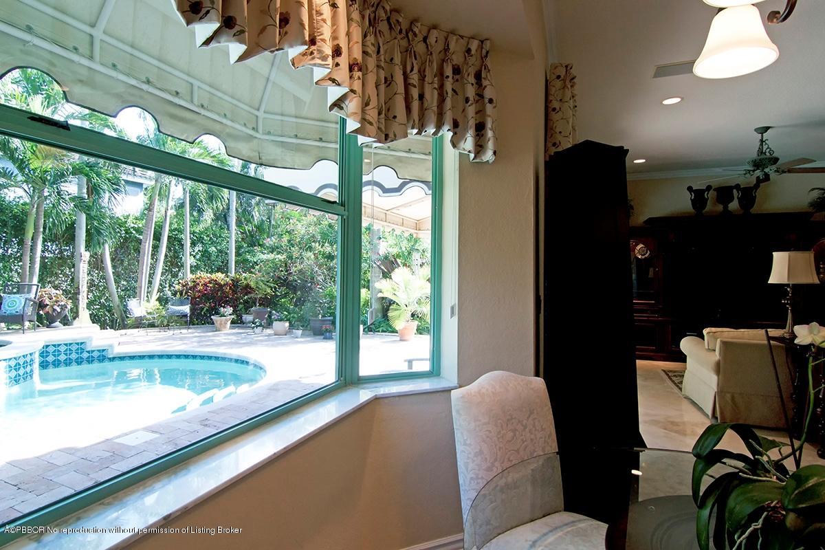 338 Southwest 16th Street Boca Raton, FL 33432 - Photo 11 of 31 a living room with furniture and a large window
