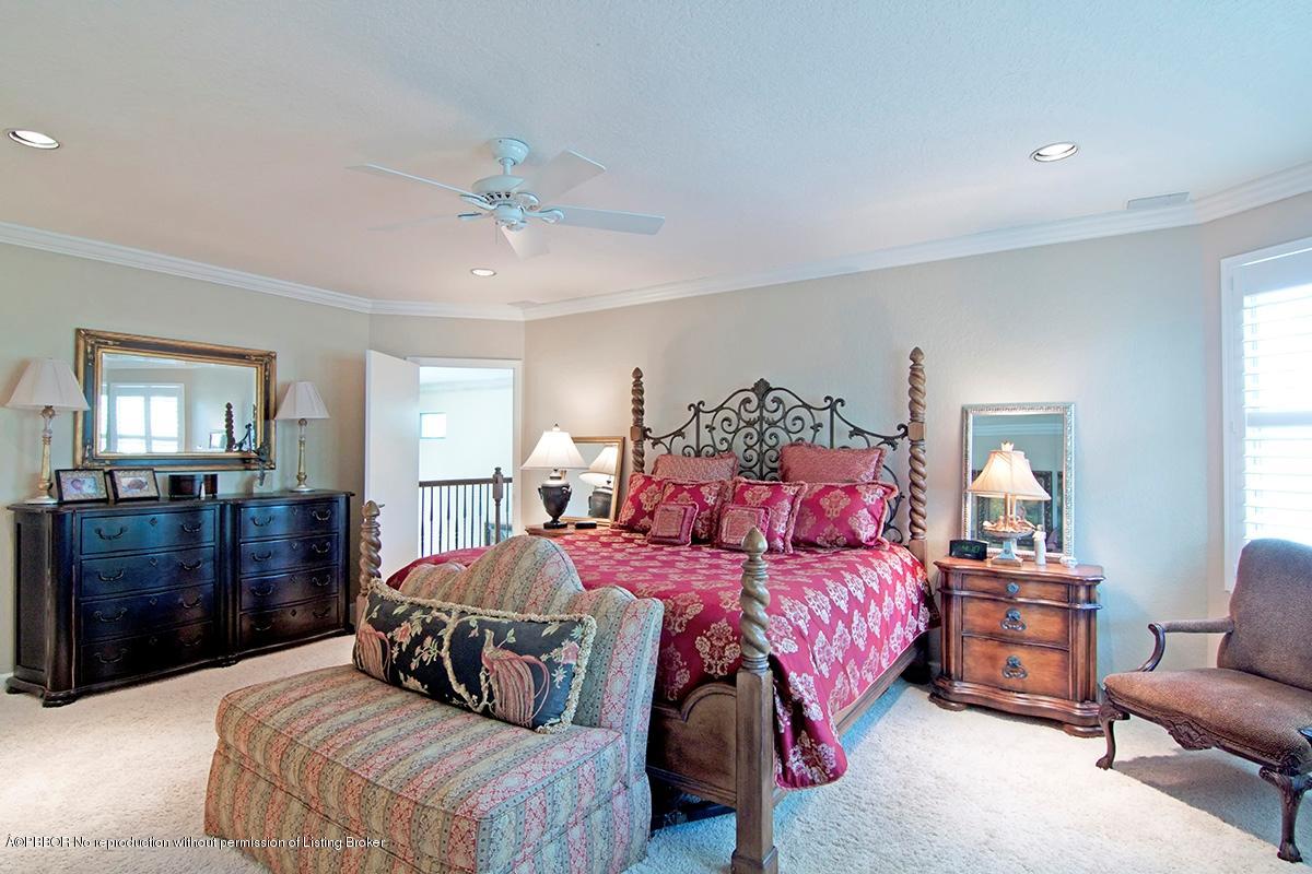 338 Southwest 16th Street Boca Raton, FL 33432 - Photo 14 of 31 a bedroom with a bed and dresser