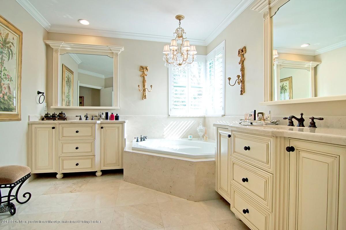 338 Southwest 16th Street Boca Raton, FL 33432 - Photo 16 of 31 a spacious bathroom with a granite countertop sink mirror and a bathtub
