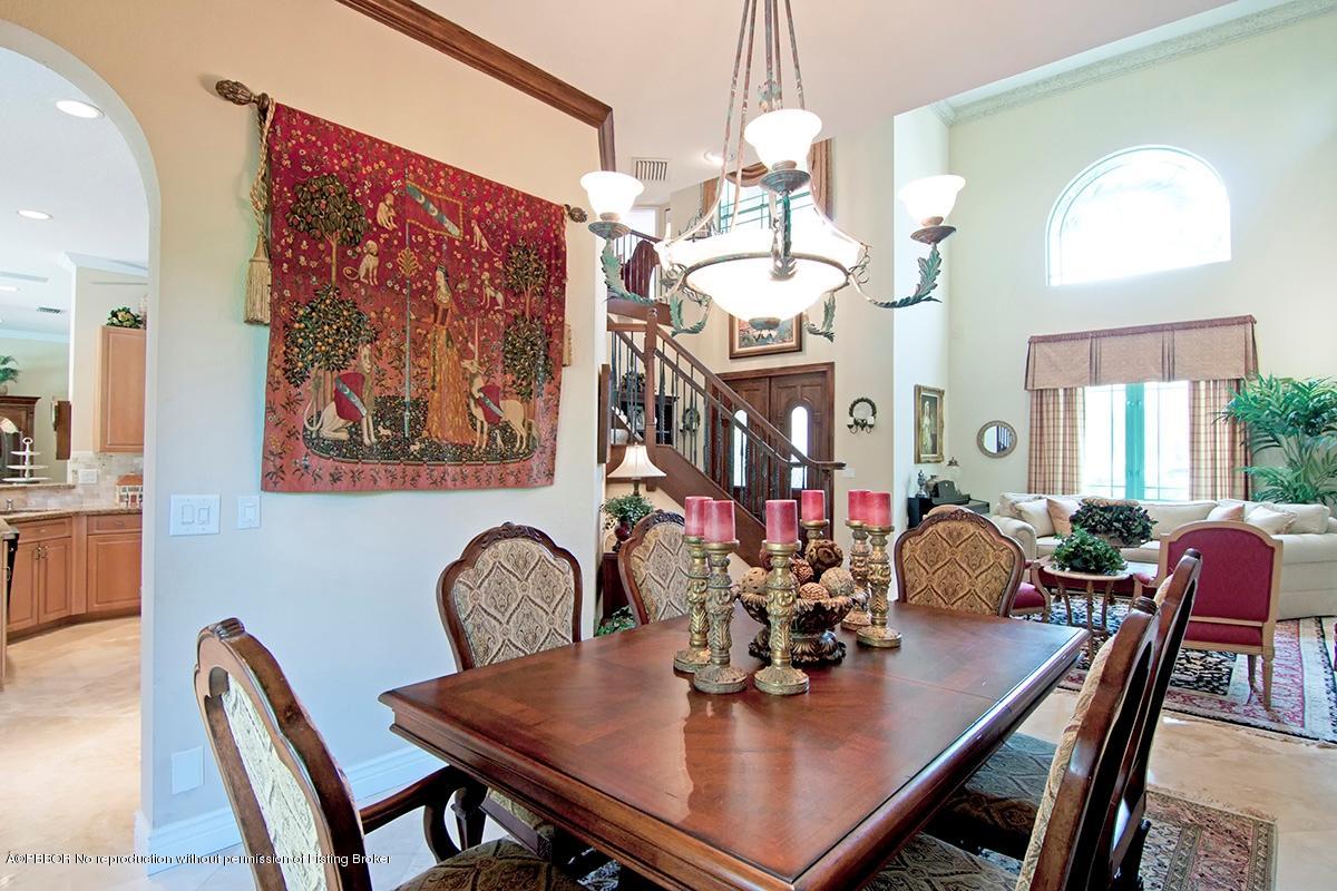 338 Southwest 16th Street Boca Raton, FL 33432 - Photo 3 of 31 a view of a dining room with furniture and chandelier