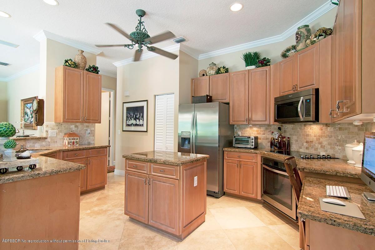 338 Southwest 16th Street Boca Raton, FL 33432 - Photo 6 of 31 a kitchen with a sink stove and refrigerator