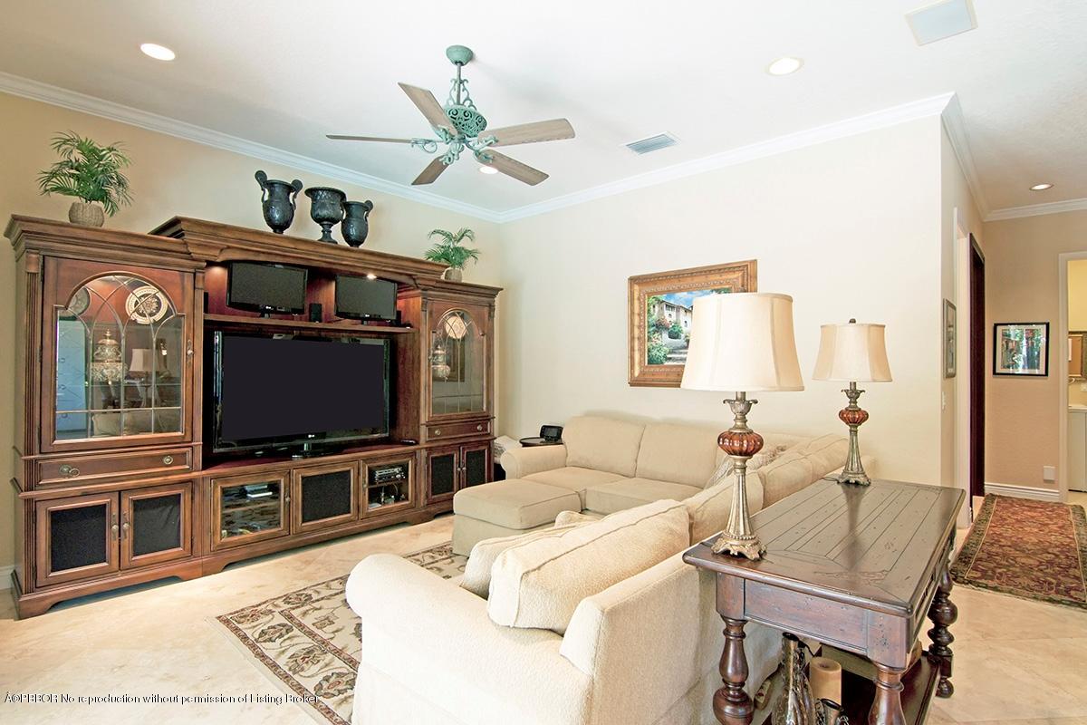 338 Southwest 16th Street Boca Raton, FL 33432 - Photo 8 of 31 a living room with furniture and a flat screen tv