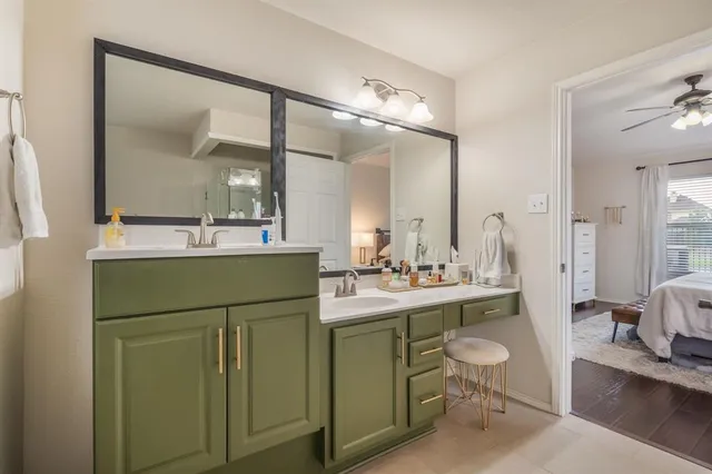 a room with sink washer and dryer