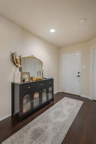a view of a bedroom with a furniture