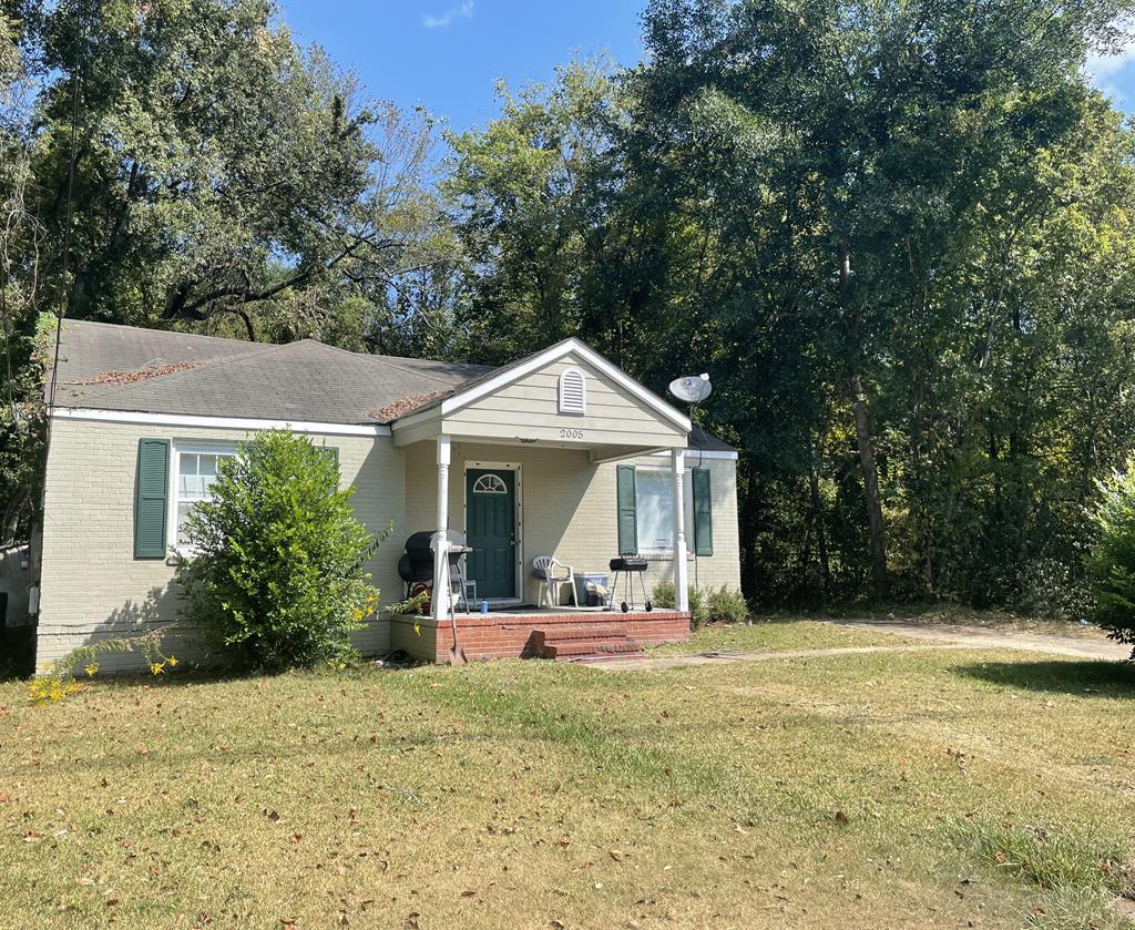 2005 7th Street Columbus, GA 31906 - Photo 2 of 2 a front view of a house with garden