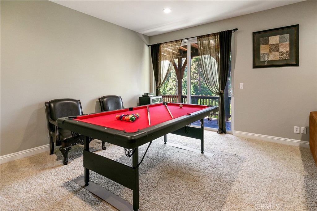 28449 Fresh Spring Lane Lake Arrowhead, CA 92352 - Photo 24 of 55 a room with pool table and windows