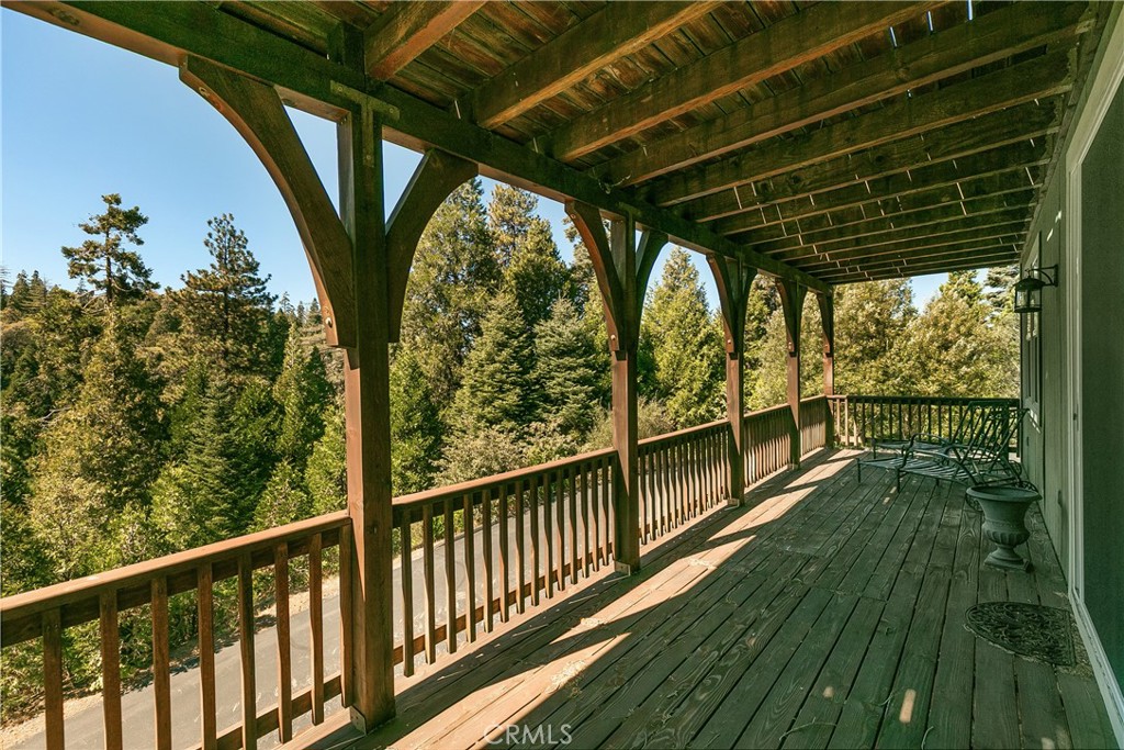 28449 Fresh Spring Lane Lake Arrowhead, CA 92352 - Photo 26 of 55 a view of balcony with wooden floor