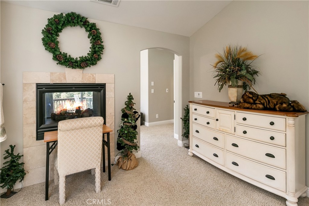28449 Fresh Spring Lane Lake Arrowhead, CA 92352 - Photo 27 of 55 a living room with furniture and a potted plant