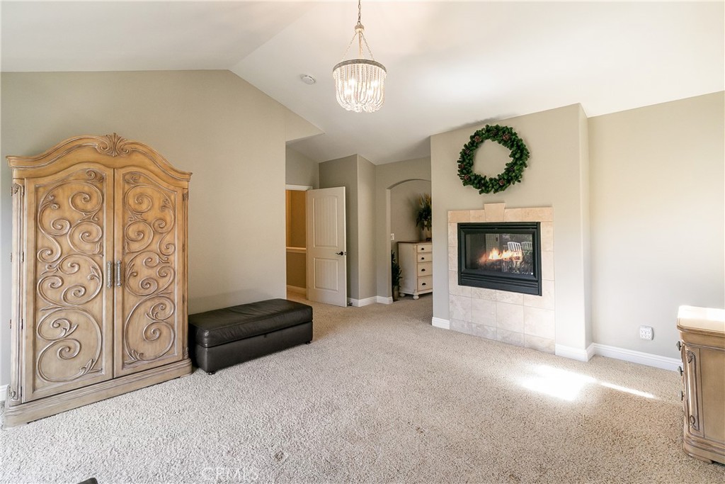 28449 Fresh Spring Lane Lake Arrowhead, CA 92352 - Photo 31 of 55 a view of an empty room with a fireplace