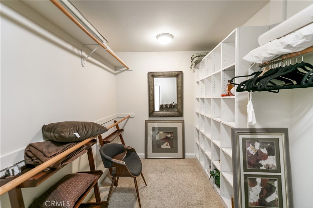 28449 Fresh Spring Lane Lake Arrowhead, CA 92352 - Photo 32 of 55 a living room with furniture and a flat screen tv