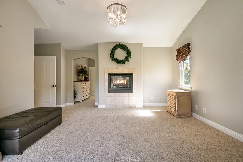 28449 Fresh Spring Lane Lake Arrowhead, CA 92352 - Photo 34 of 55 a view of a livingroom with furniture and a window