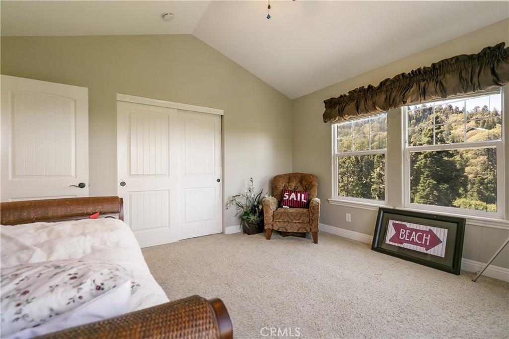 28449 Fresh Spring Lane Lake Arrowhead, CA 92352 - Photo 38 of 55 a bedroom with furniture and a window
