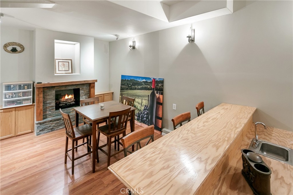 28449 Fresh Spring Lane Lake Arrowhead, CA 92352 - Photo 51 of 55 a very nice looking dining room with a table and chairs