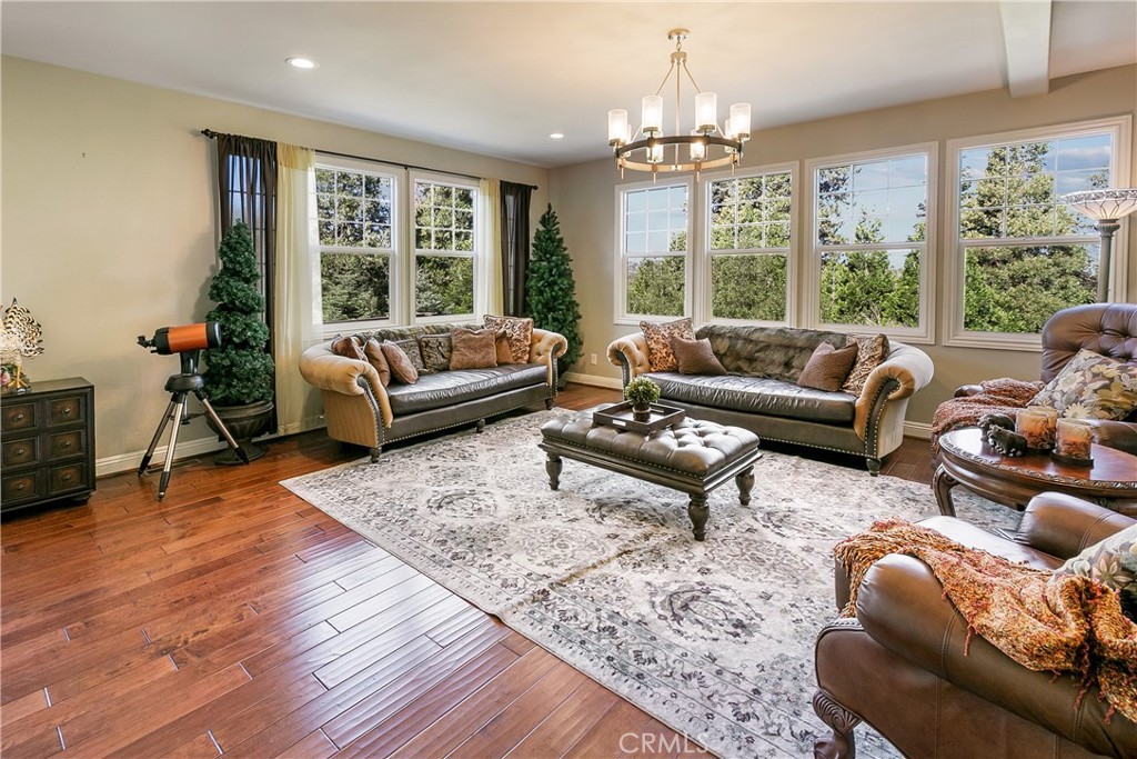 28449 Fresh Spring Lane Lake Arrowhead, CA 92352 - Photo 7 of 55 a living room with furniture and a large window