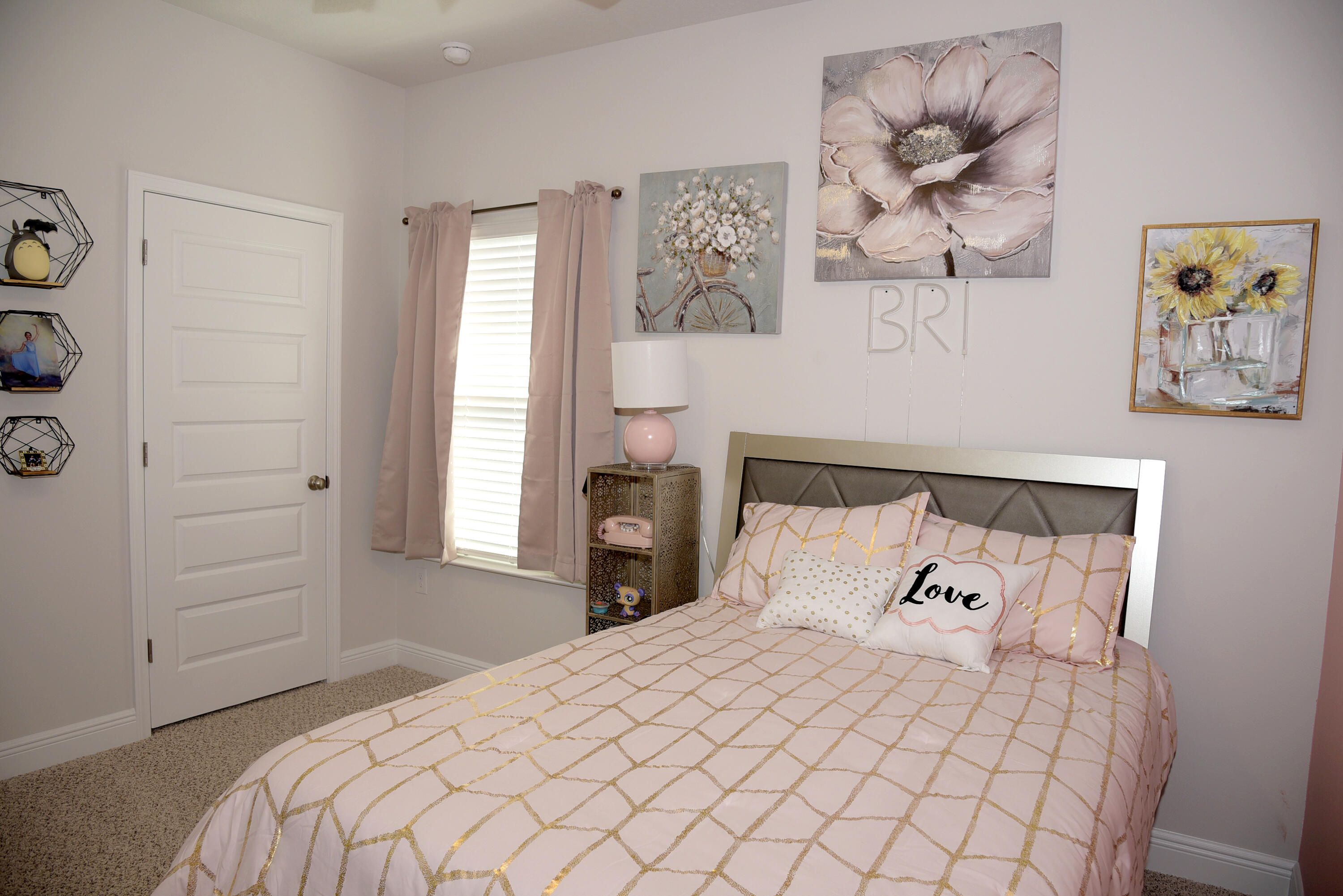 328 Lightning Bug Lane Freeport, FL 32439 - Photo 31 of 43 a bedroom with a bed and painting on the wall