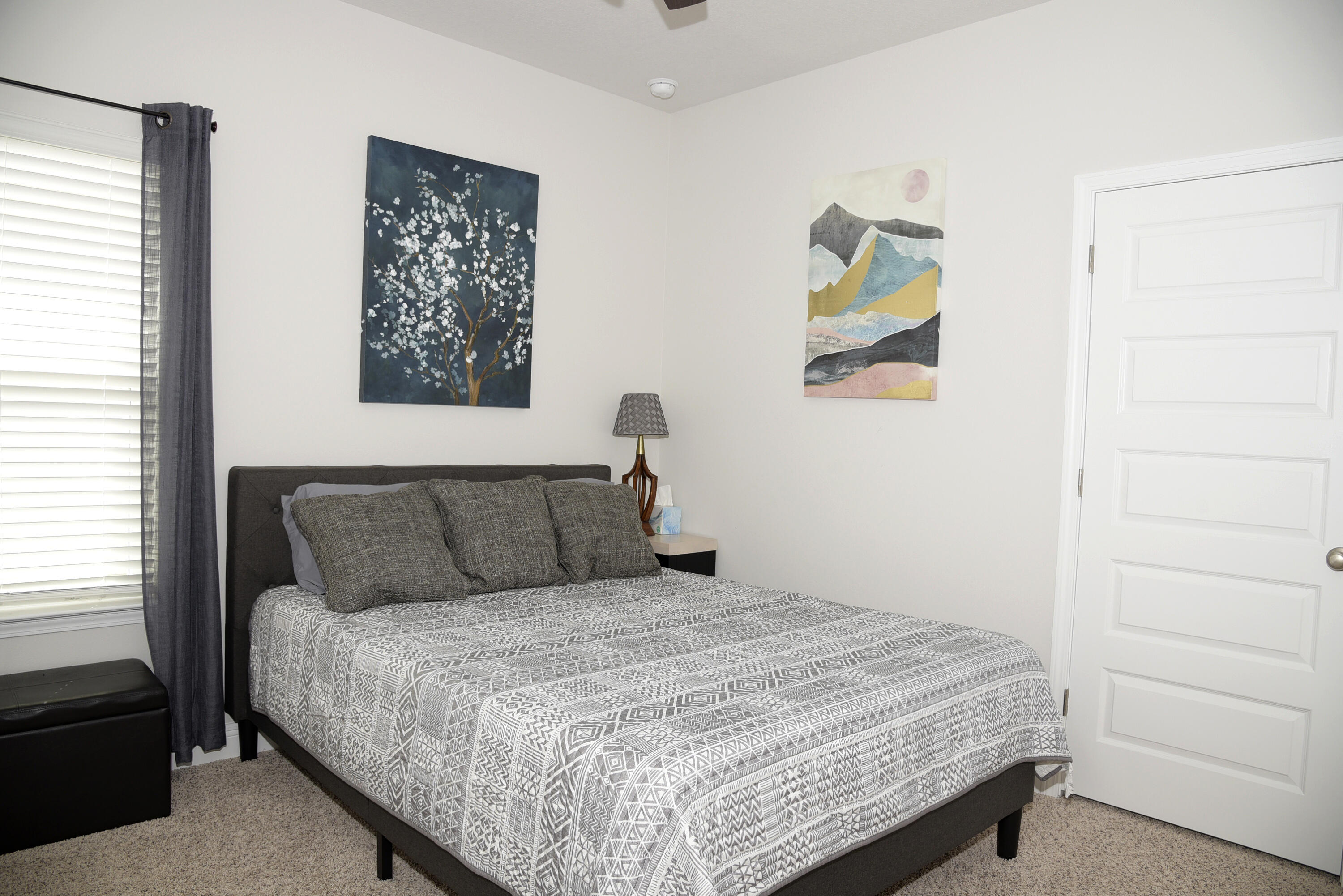 328 Lightning Bug Lane Freeport, FL 32439 - Photo 35 of 43 a bedroom with a bed and a window