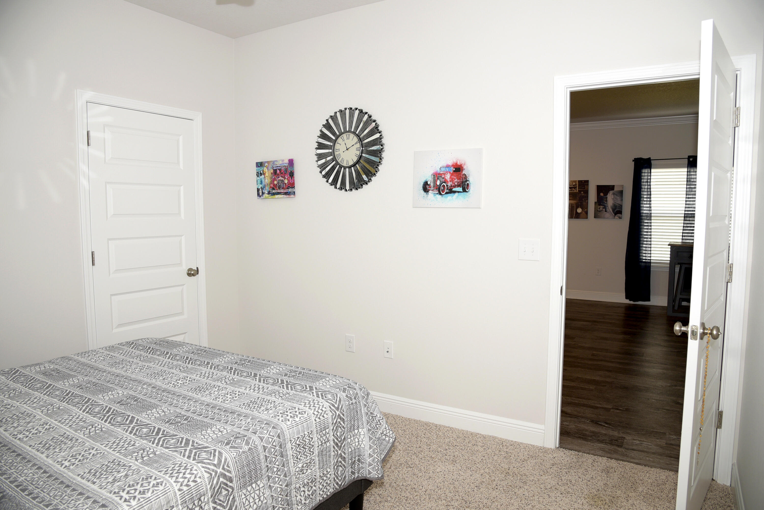 328 Lightning Bug Lane Freeport, FL 32439 - Photo 36 of 43 a bedroom with a bed and a table