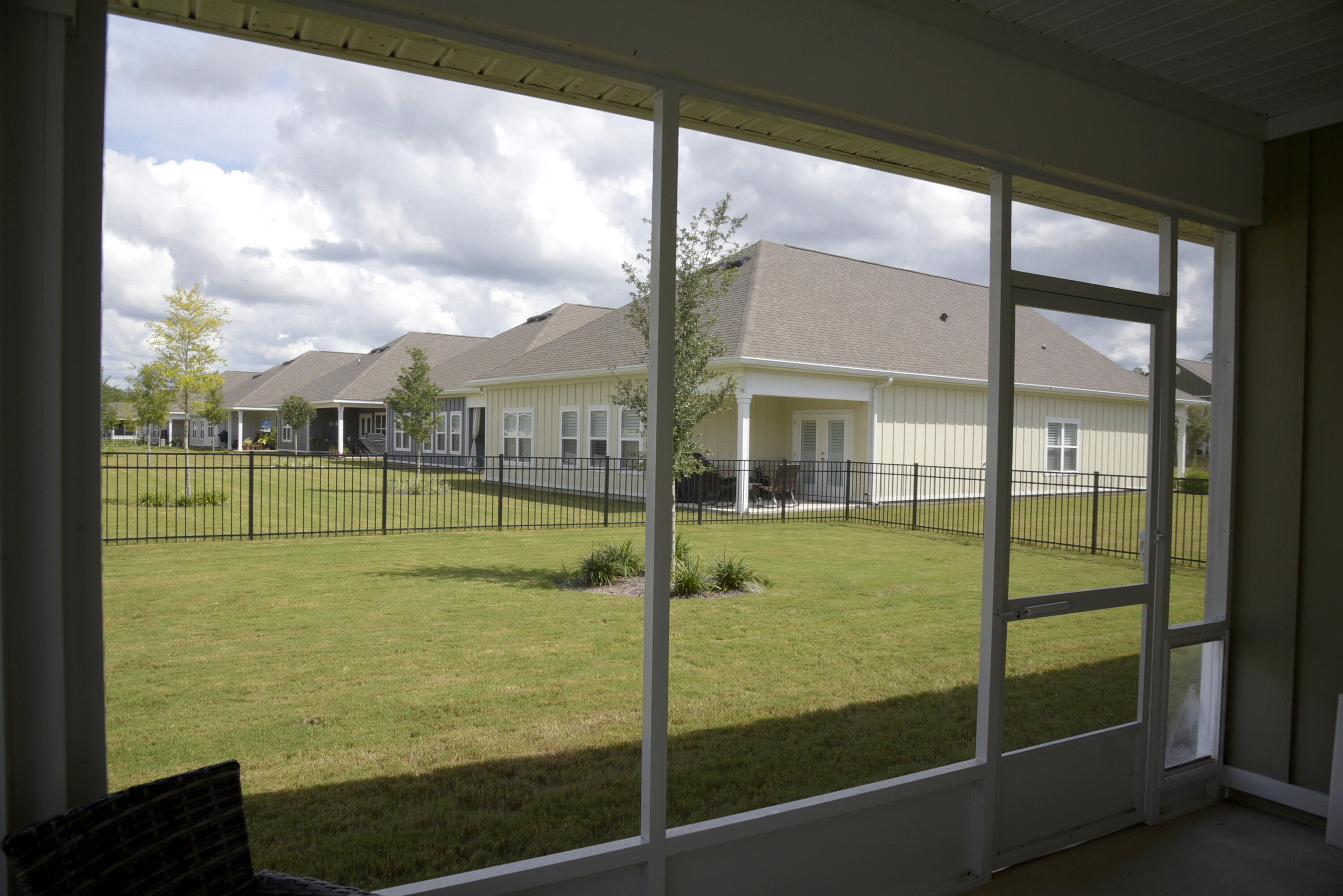 328 Lightning Bug Lane Freeport, FL 32439 - Photo 40 of 43 a view of a building from a window
