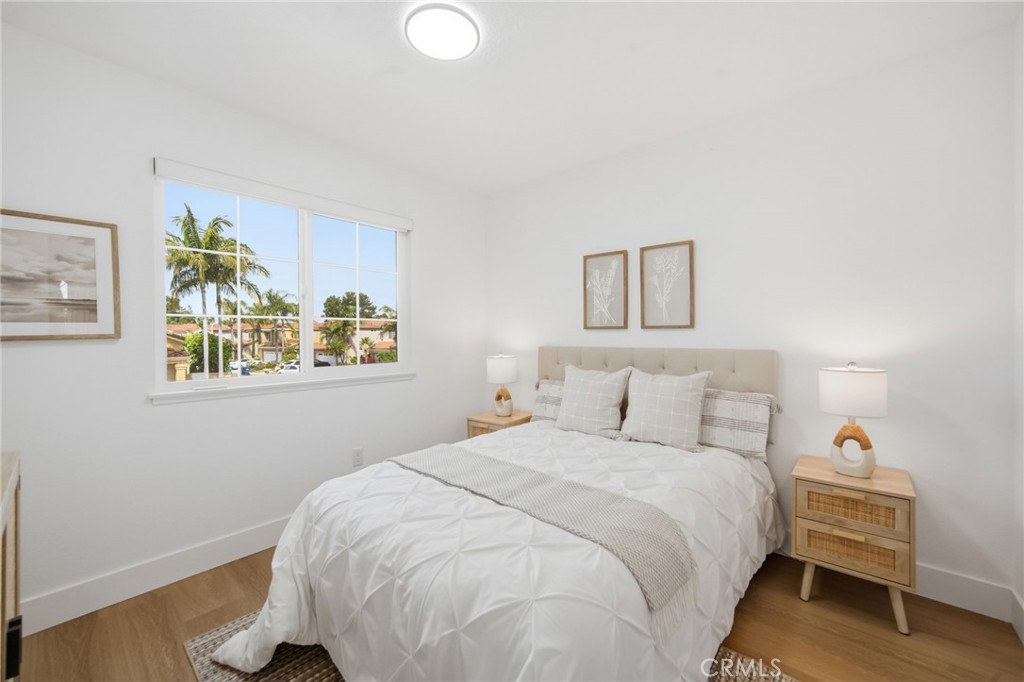32 Comiso Irvine, CA 92614 - Photo 20 of 22 a bedroom with a bed and a window