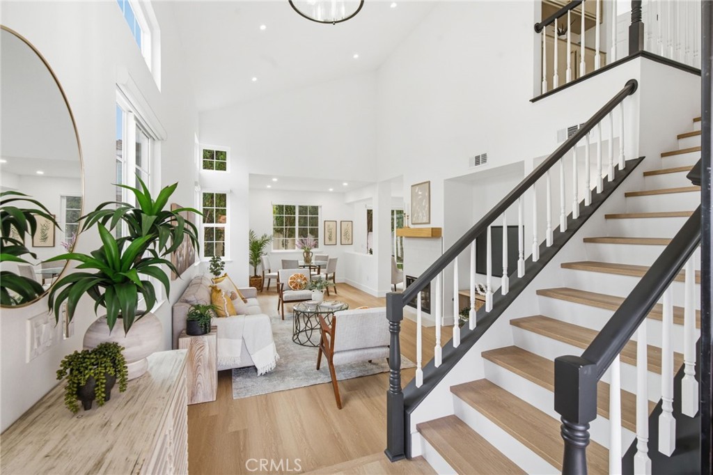 32 Comiso Irvine, CA 92614 - Photo 2 of 22 a view of entryway and hall with wooden floor