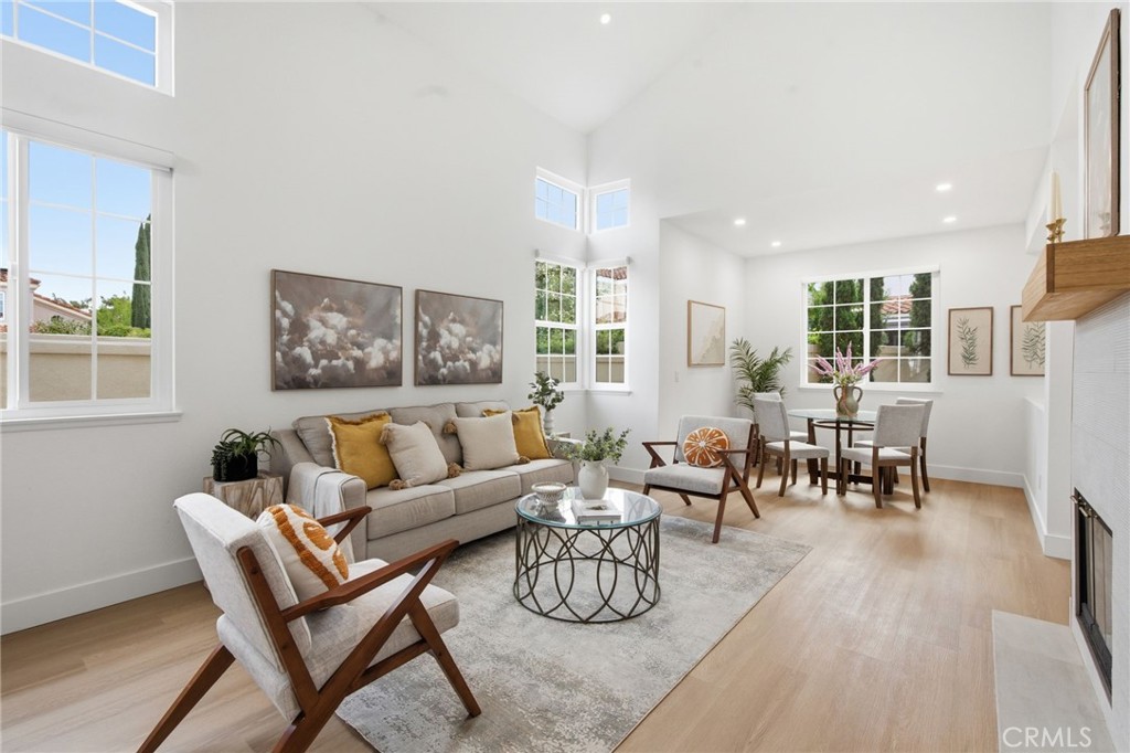 32 Comiso Irvine, CA 92614 - Photo 4 of 22 a living room with furniture and wooden floor