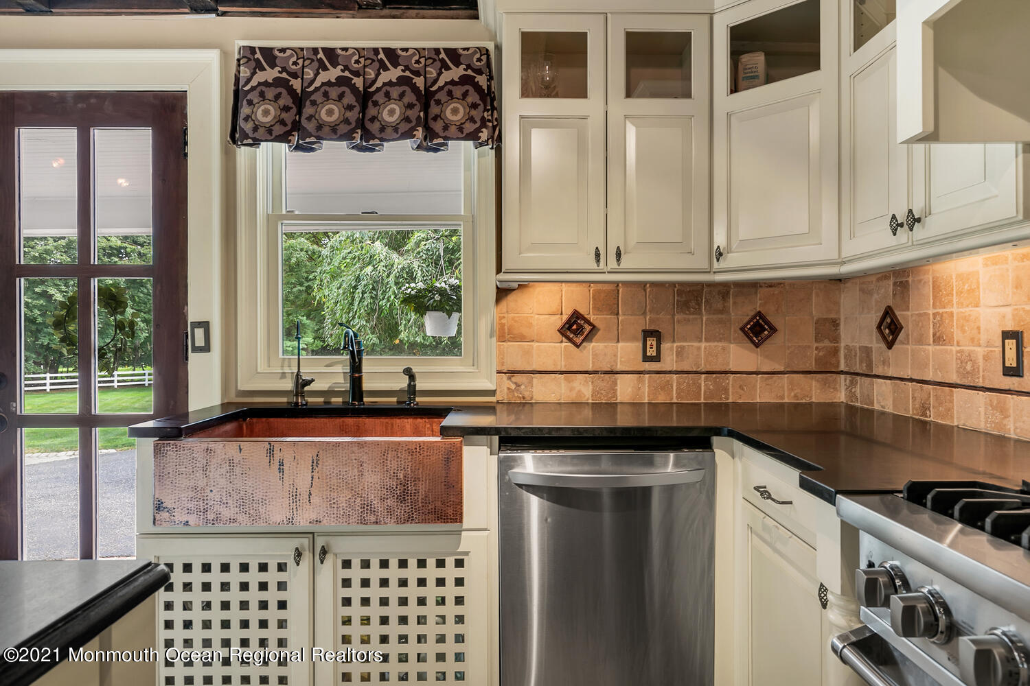 60 Conover Road Colts Neck, NJ 07722 - Photo 14 of 44 a kitchen with granite countertop a sink and a stove