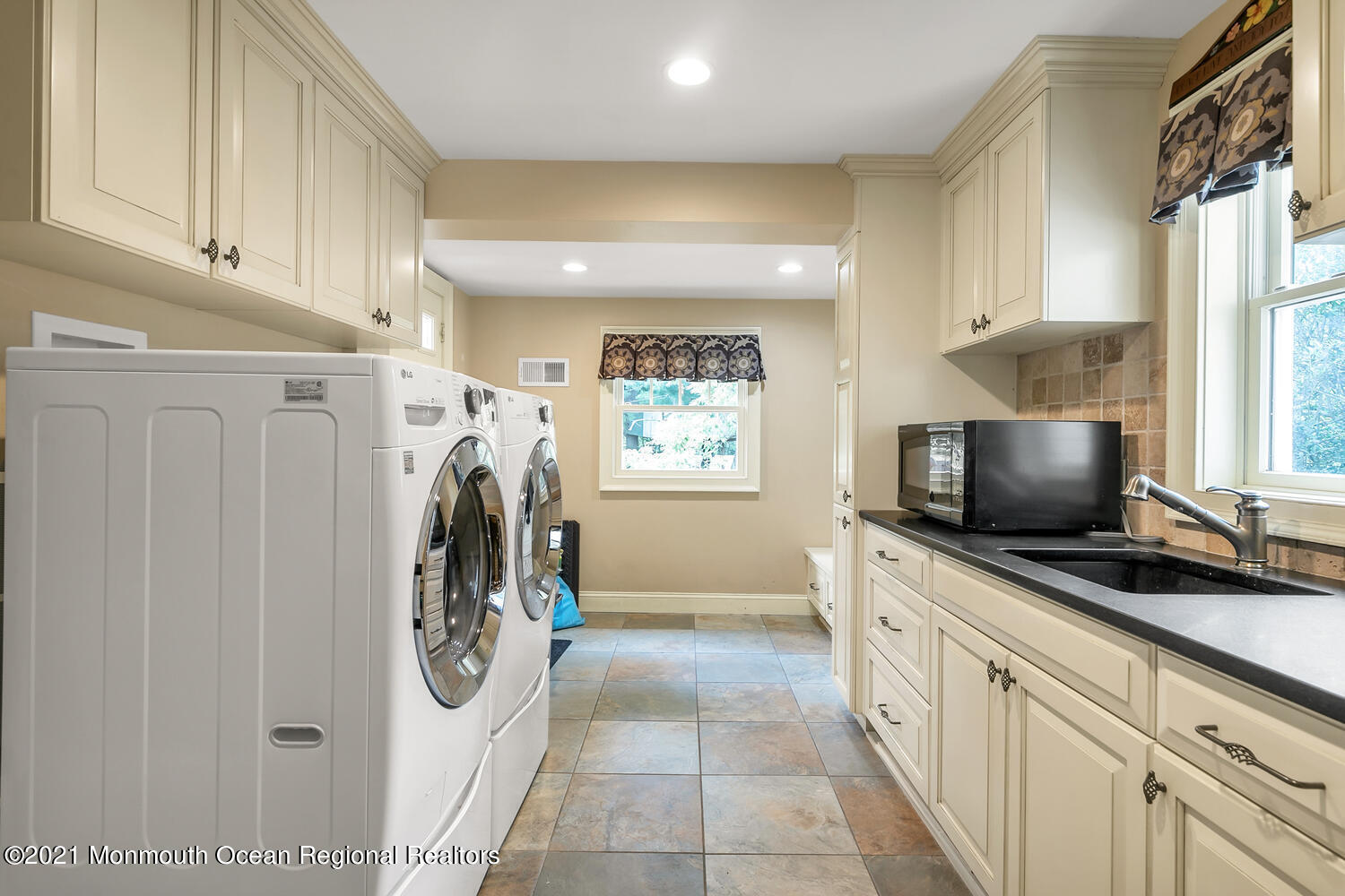 60 Conover Road Colts Neck, NJ 07722 - Photo 15 of 44 a view of a kitchen with utility and a window