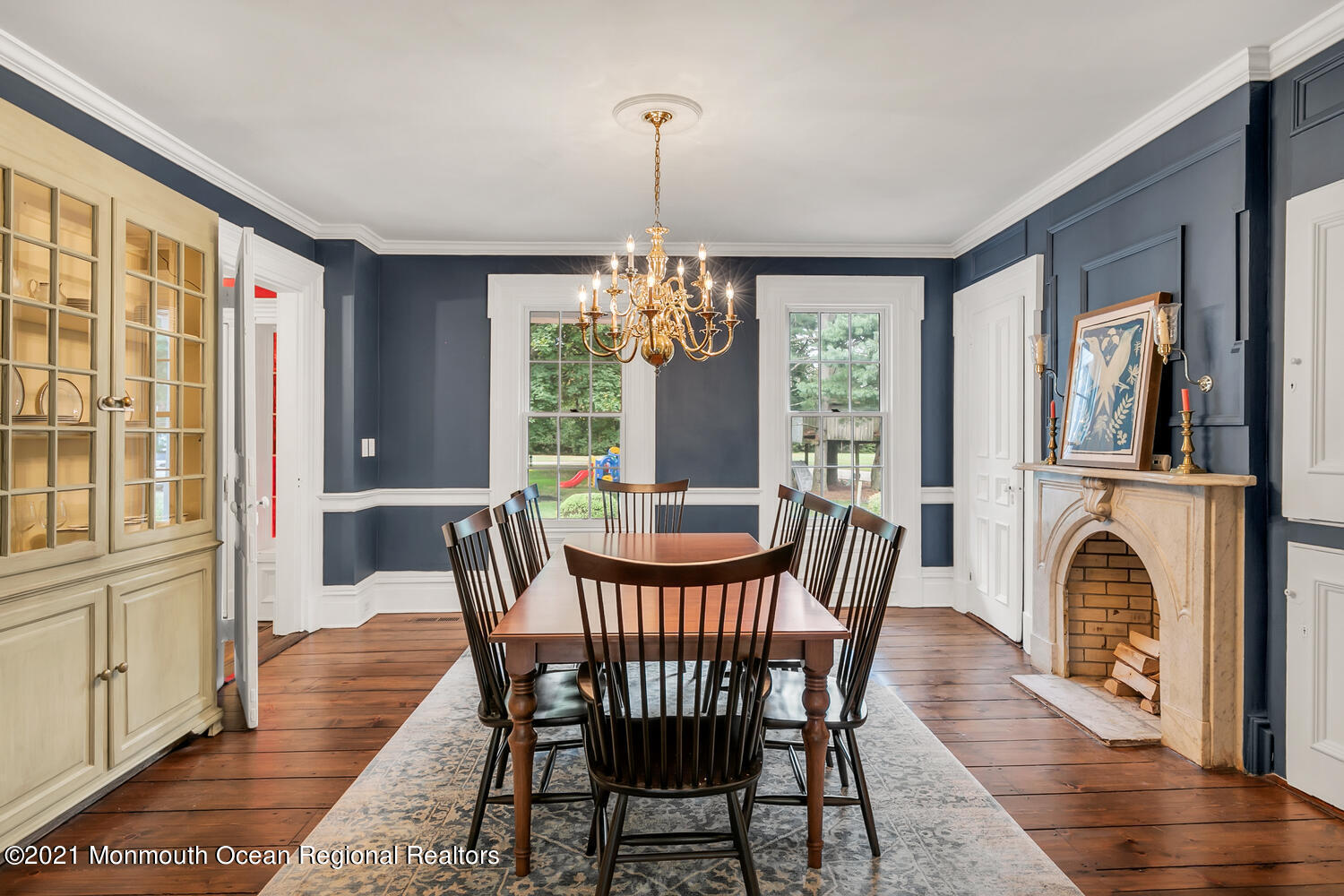 60 Conover Road Colts Neck, NJ 07722 - Photo 20 of 44 a view of a dining room with furniture window and wooden floor