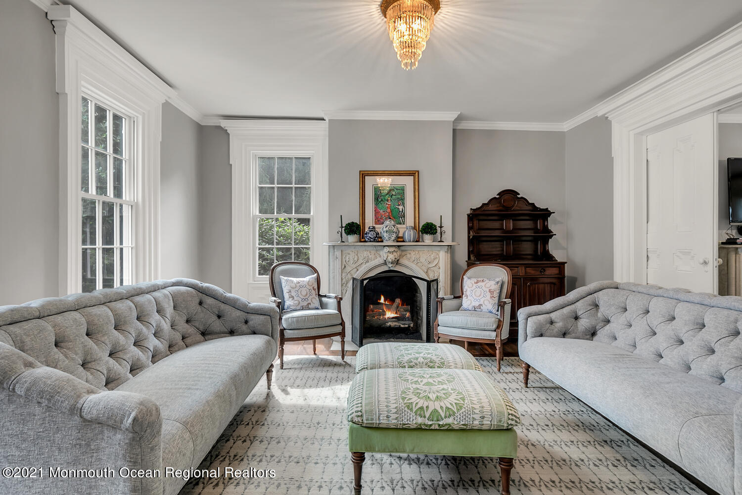 60 Conover Road Colts Neck, NJ 07722 - Photo 23 of 44 a living room with furniture and a fireplace