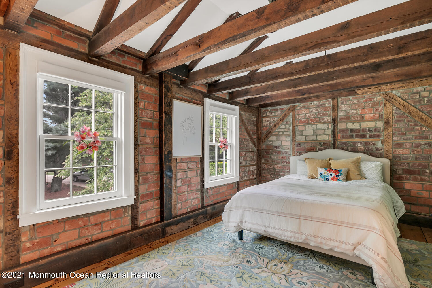 60 Conover Road Colts Neck, NJ 07722 - Photo 32 of 44 a bedroom with a bed next to a window