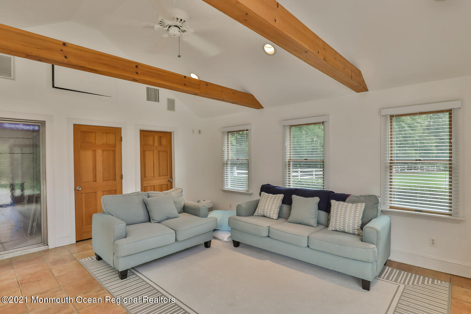 60 Conover Road Colts Neck, NJ 07722 - Photo 39 of 44 a living room with furniture and a large window