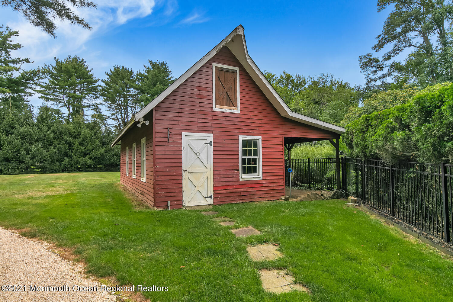 60 Conover Road Colts Neck, NJ 07722 - Photo 5 of 44 a front view of house with backyard and green space