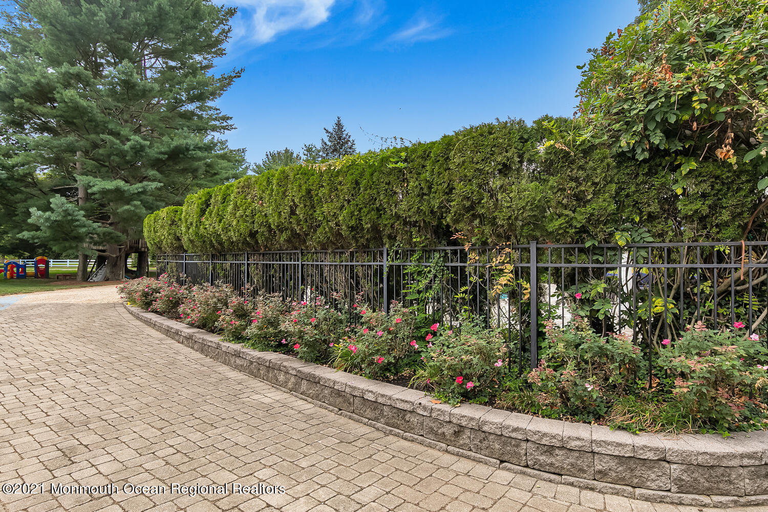 60 Conover Road Colts Neck, NJ 07722 - Photo 43 of 44 a view of a garden with flower plants