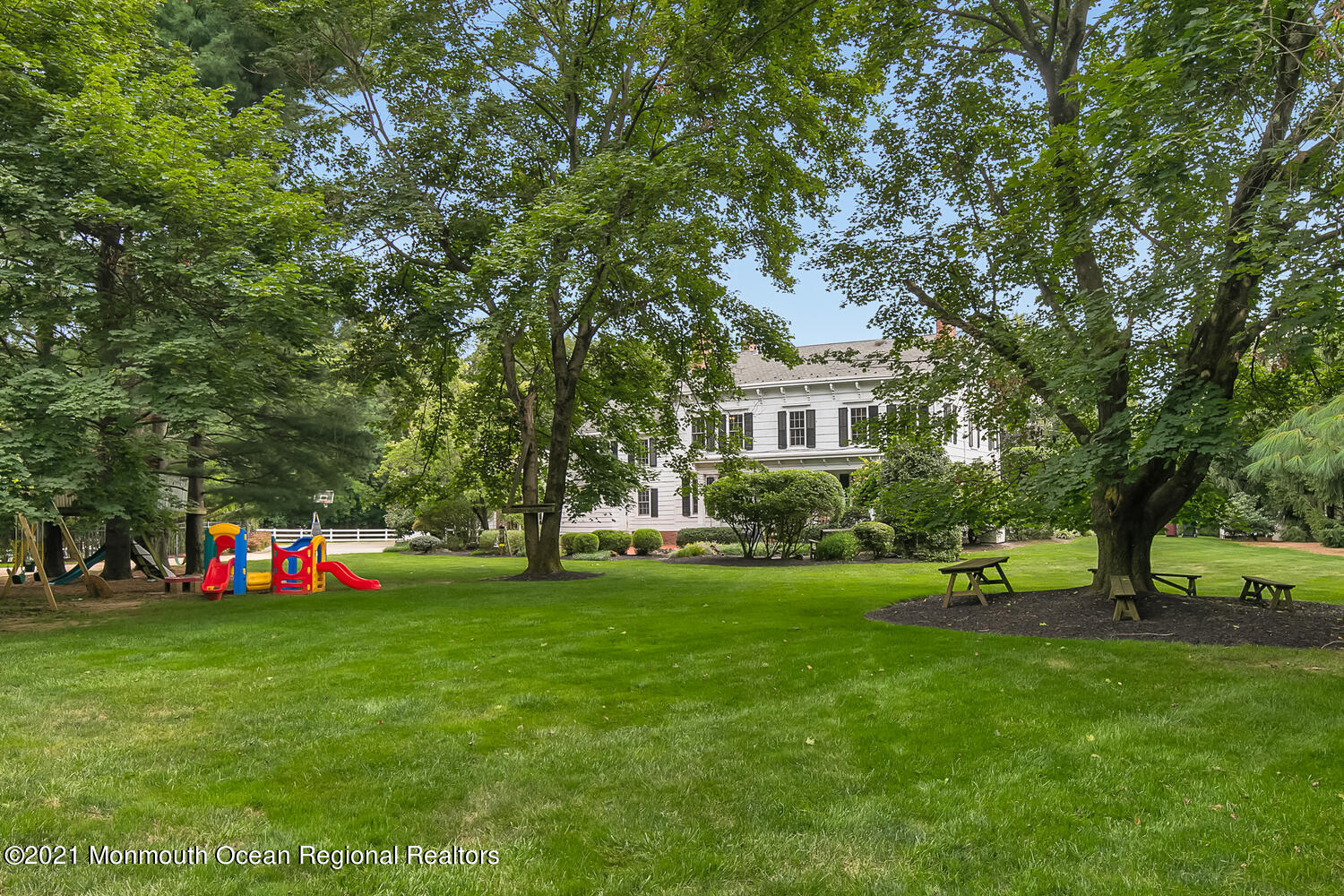 60 Conover Road Colts Neck, NJ 07722 - Photo 7 of 44 a front view of a house with garden