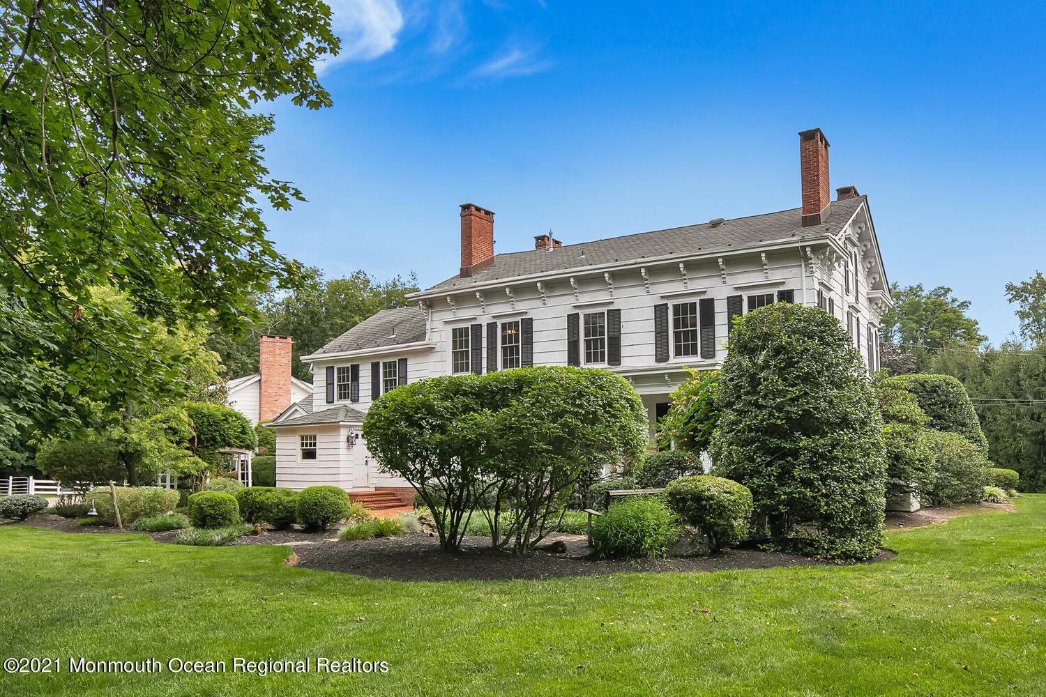 60 Conover Road Colts Neck, NJ 07722 - Photo 8 of 44 a front view of a house with a garden
