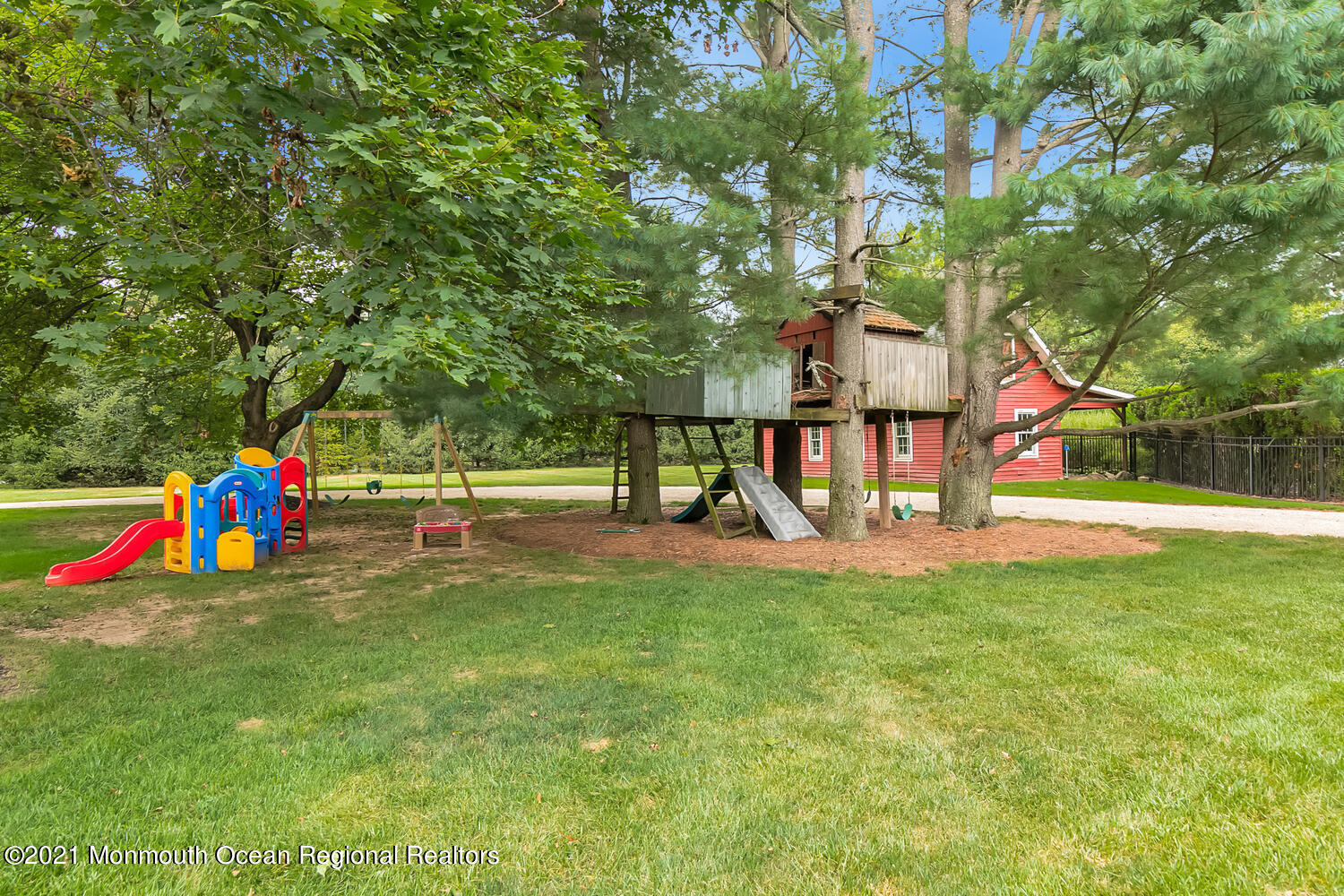 60 Conover Road Colts Neck, NJ 07722 - Photo 9 of 44 a view of park with swings and slides