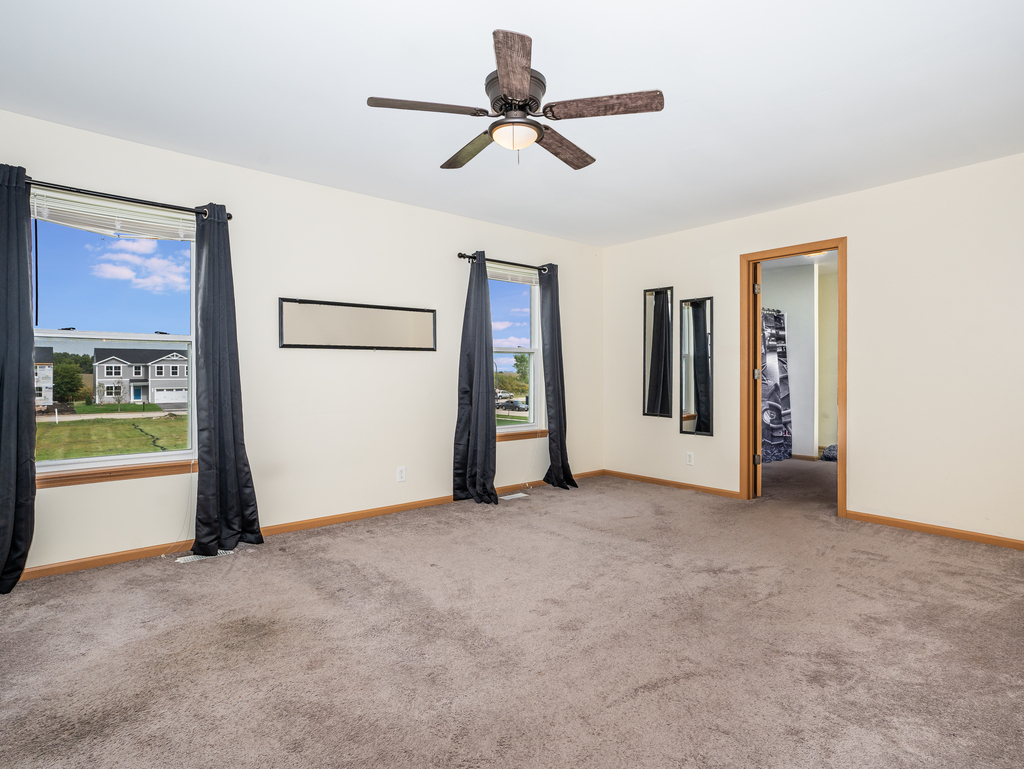816 Kennedy Street Waterman, IL 60556 - Photo 13 of 27 a view of empty room with ceiling fan