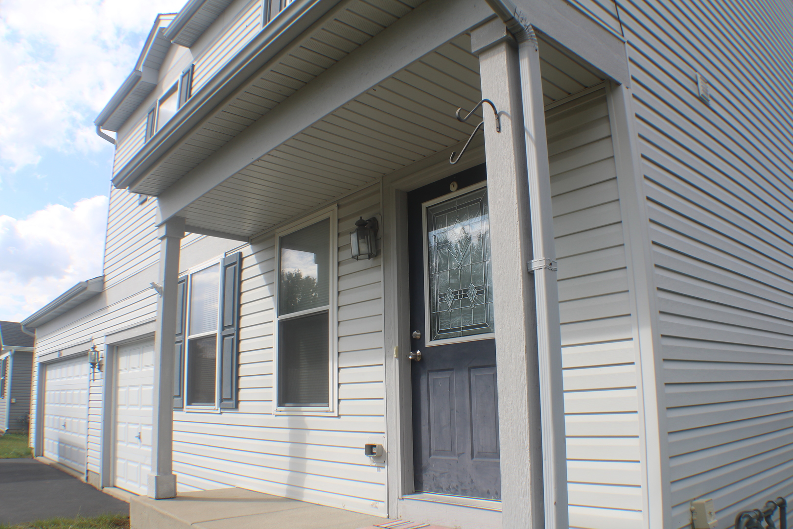 816 Kennedy Street Waterman, IL 60556 - Photo 2 of 27 a view of a brick house with a large window