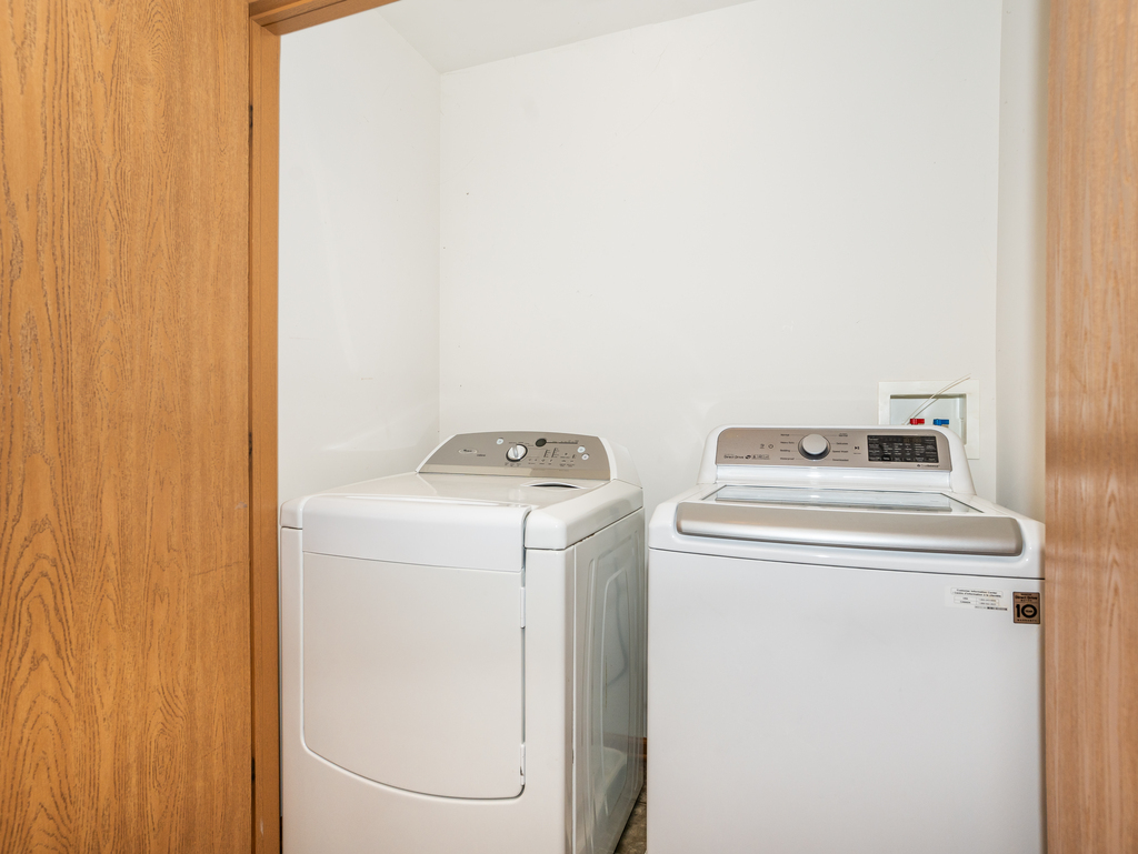 816 Kennedy Street Waterman, IL 60556 - Photo 21 of 27 a utility room with dryer and washer
