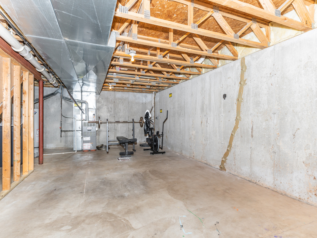 816 Kennedy Street Waterman, IL 60556 - Photo 23 of 27 a view of a room with wooden walls and stairs