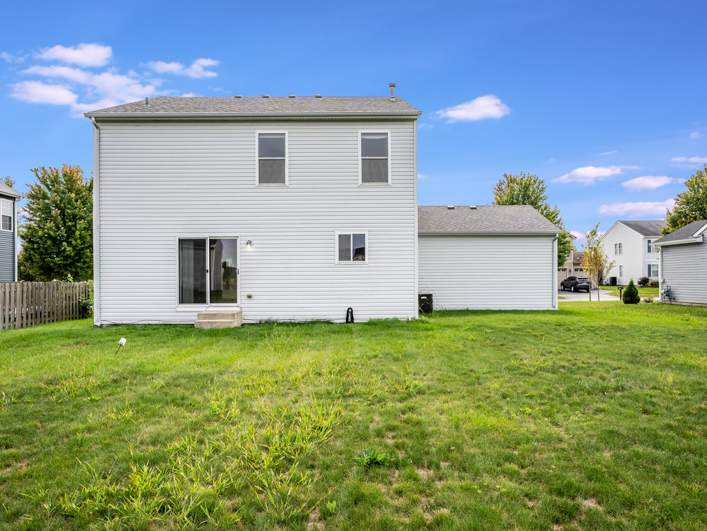 816 Kennedy Street Waterman, IL 60556 - Photo 25 of 27 a house view with a backyard space