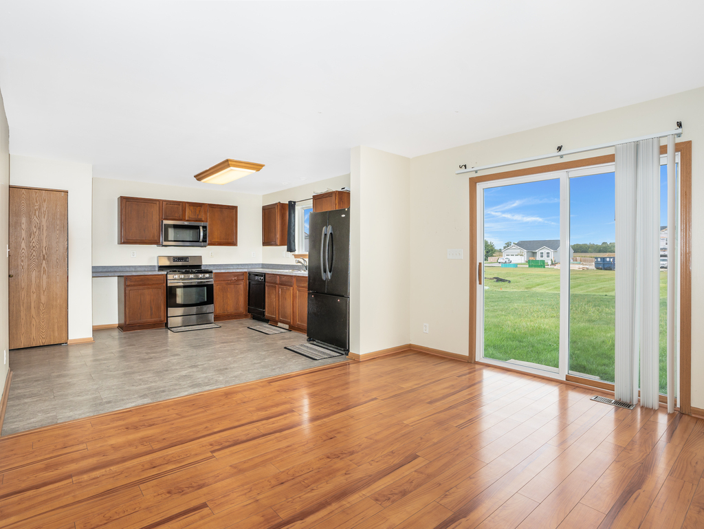 816 Kennedy Street Waterman, IL 60556 - Photo 5 of 27 a view of kitchen with wooden floor