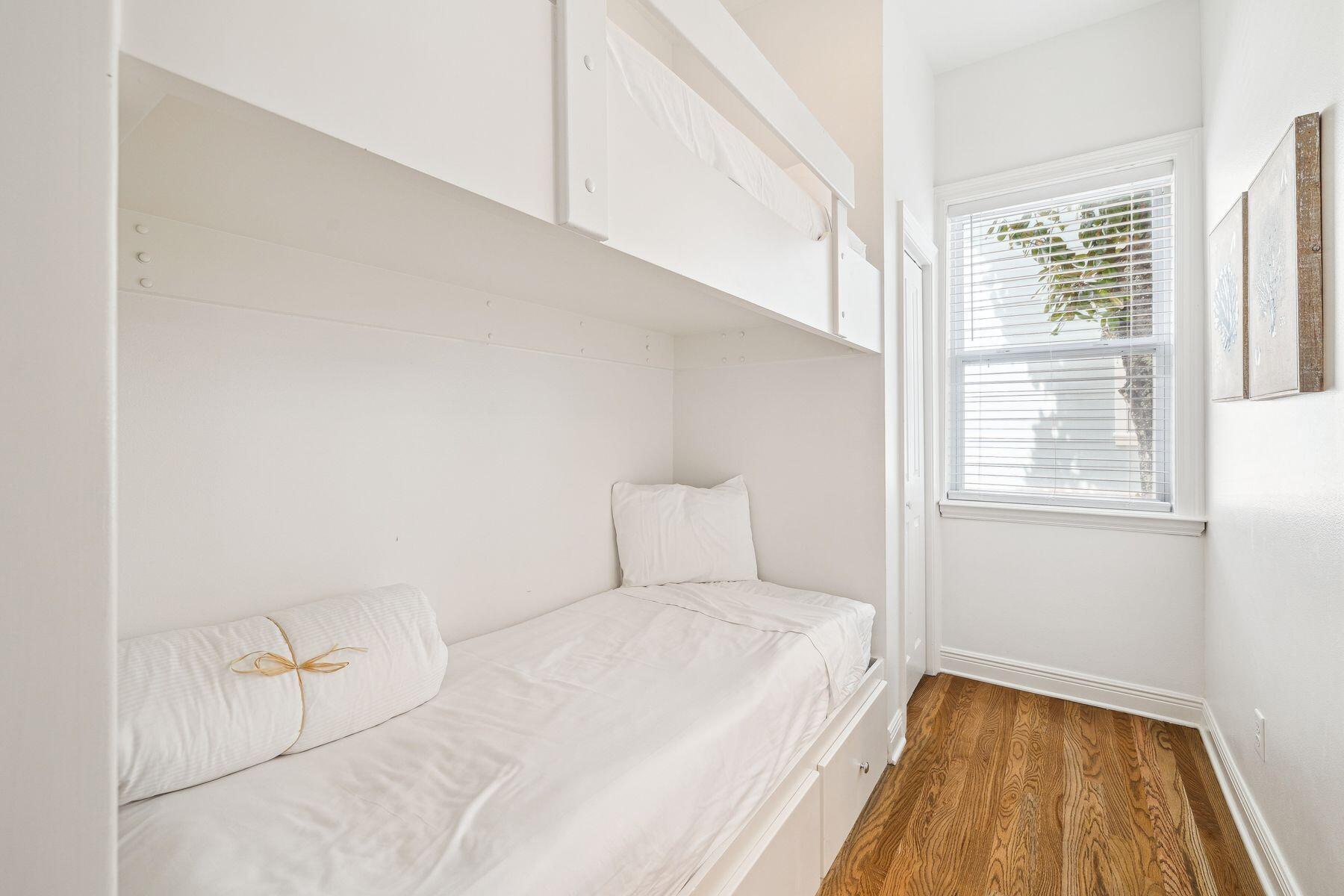 32 Hickory Street Santa Rosa Beach, FL 32459 - Photo 12 of 33 a bedroom with a bed and a window